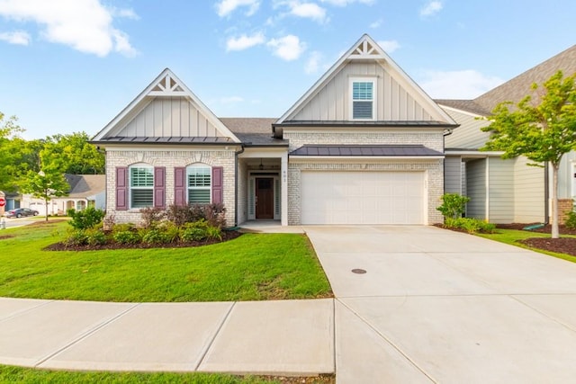 craftsman-style home featuring a garage and a front lawn