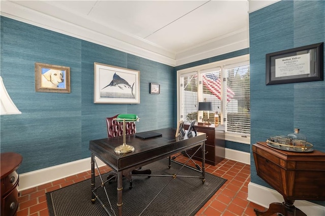 office with crown molding, wallpapered walls, brick floor, and baseboards