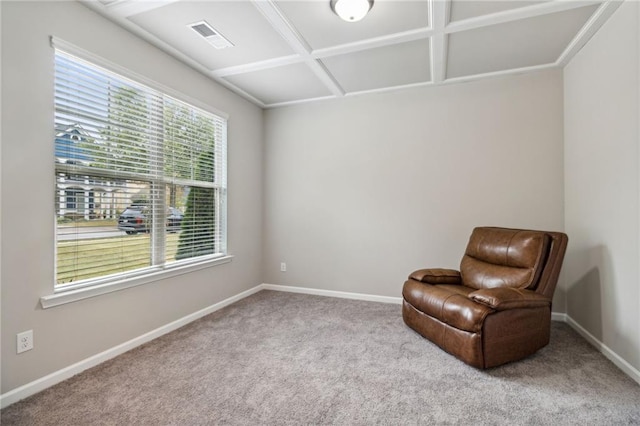 unfurnished room featuring a healthy amount of sunlight, light carpet, and coffered ceiling