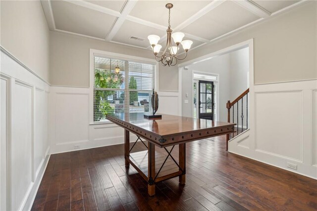 office with dark hardwood / wood-style floors, an inviting chandelier, and coffered ceiling