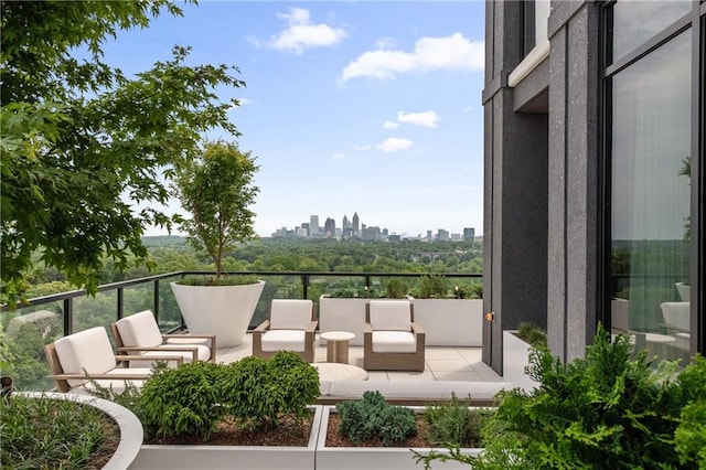 2425 Peachtree Rd NE Unit 1503, Atlanta, GA 30305 - view of patio with a view of skyline and a balcony
