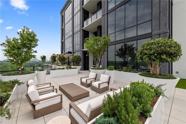 2425 Peachtree Rd NE Unit 1503, Atlanta, GA 30305 - view of patio featuring an outdoor hangout area