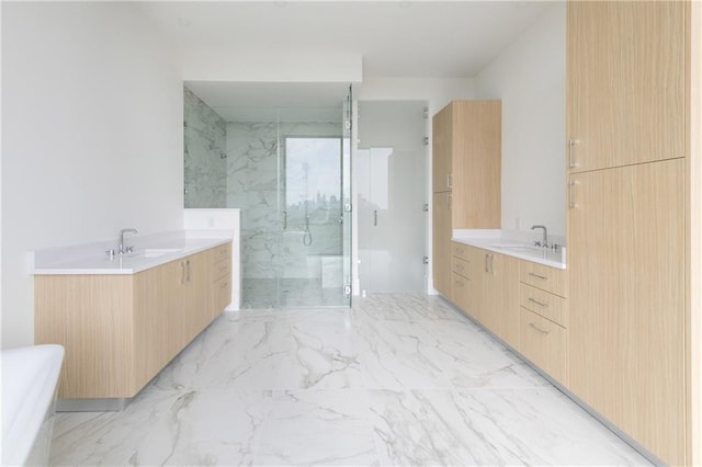 2425 Peachtree Rd NE Unit 1503, Atlanta, GA 30305 - full bath featuring a marble finish shower, two vanities, marble finish floors, and a bathtub
