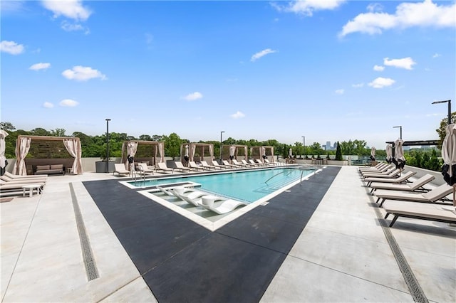 2425 Peachtree Rd NE Unit 1503, Atlanta, GA 30305 - community pool featuring a patio area and a pergola