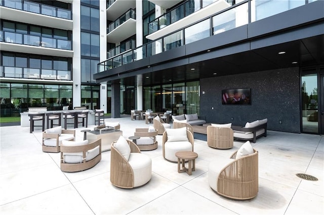 2425 Peachtree Rd NE Unit 1503, Atlanta, GA 30305 - view of patio / terrace featuring an outdoor living space