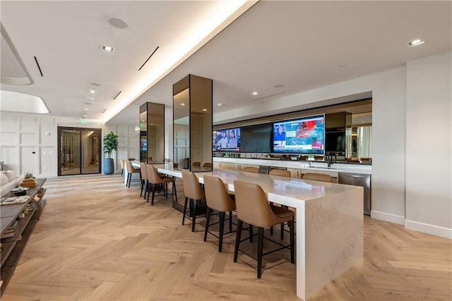 2425 Peachtree Rd NE Unit 1503, Atlanta, GA 30305 - bar area with dishwasher, baseboards, a sink, and recessed lighting