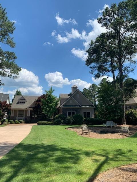 exterior space with a front yard