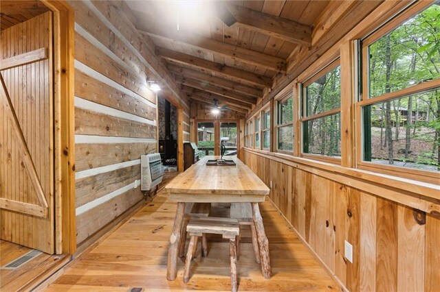 251 Honeysuckle Way, Blue Ridge, GA 30513 - dining space with wood walls, wood ceiling, healthy amount of natural light, and light wood-style floors