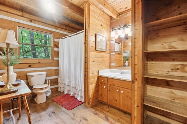 251 Honeysuckle Way, Blue Ridge, GA 30513 - full bathroom featuring wood walls, wood finished floors, toilet, vanity, and wooden ceiling with exposed beams