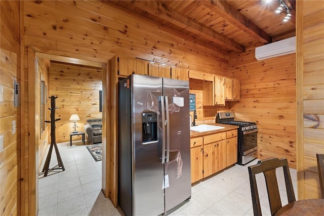 251 Honeysuckle Way, Blue Ridge, GA 30513 - kitchen featuring stainless steel appliances, wooden walls, a wall mounted AC, wooden ceiling with exposed beams, and a sink