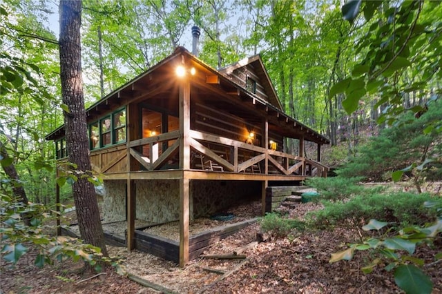 251 Honeysuckle Way, Blue Ridge, GA 30513 - view of home's exterior featuring stone siding and a wooden deck