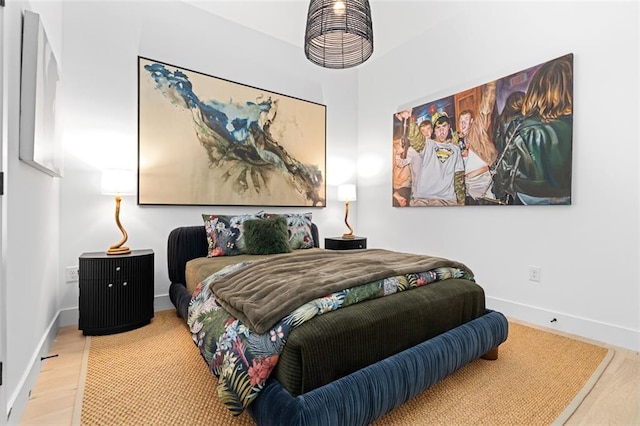 567 Ponce De Leon Ave NE Unit 606, Atlanta, GA 30308 - bedroom featuring wood finished floors and baseboards
