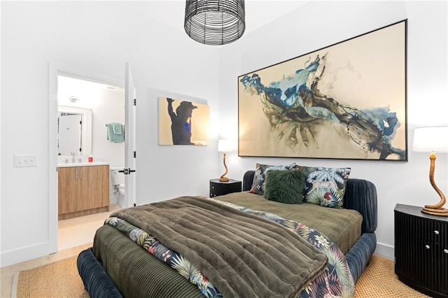 567 Ponce De Leon Ave NE Unit 606, Atlanta, GA 30308 - bedroom featuring ensuite bathroom and a sink