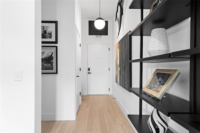 567 Ponce De Leon Ave NE Unit 606, Atlanta, GA 30308 - doorway to outside with baseboards and wood finished floors