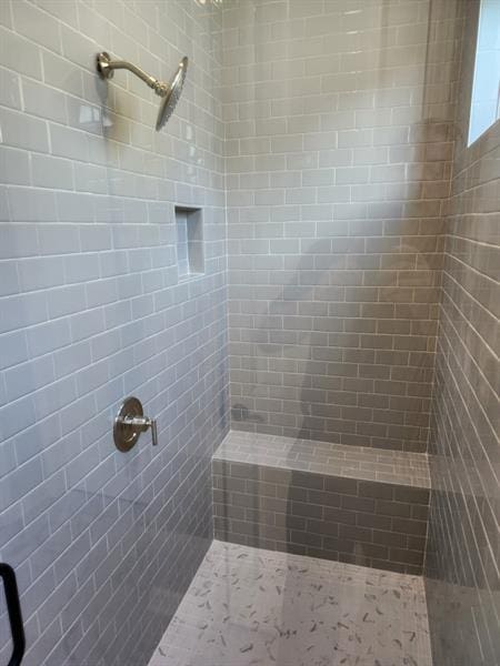 full bath featuring a stall shower