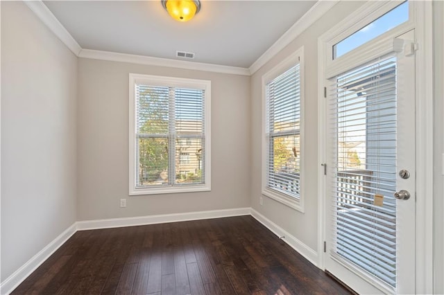 unfurnished room featuring crown molding and dark wood-type flooring