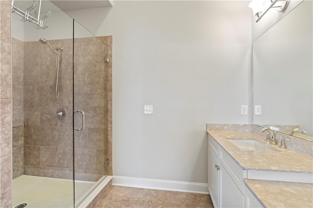 bathroom with vanity, tile patterned floors, and walk in shower