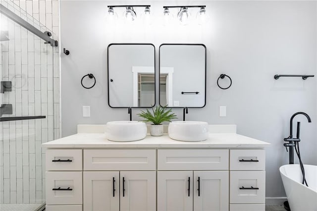 bathroom with independent shower and bath and vanity