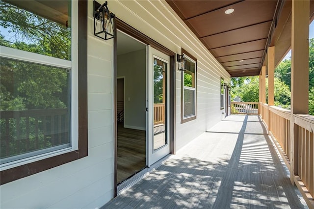 deck with covered porch