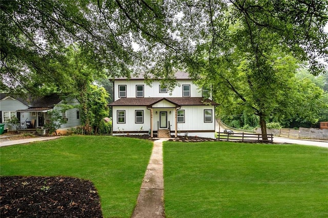 view of front of property with a front lawn