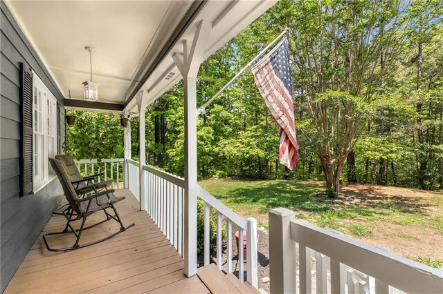 wooden deck featuring a porch