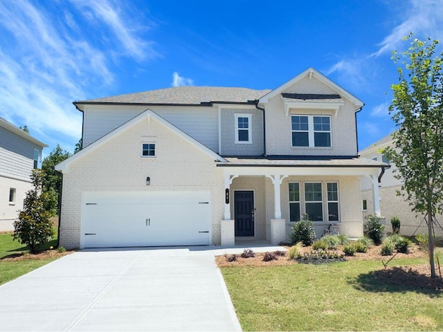 62 Sheryl Way, Loganville, GA 30052 - view of front of home featuring concrete driveway, a front yard, a porch, and brick siding