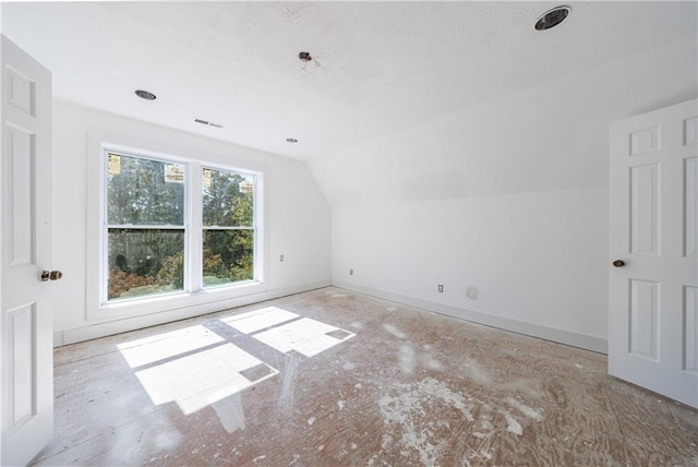 bonus room with lofted ceiling