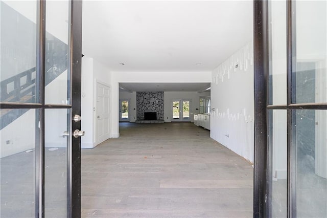 corridor featuring light hardwood / wood-style flooring