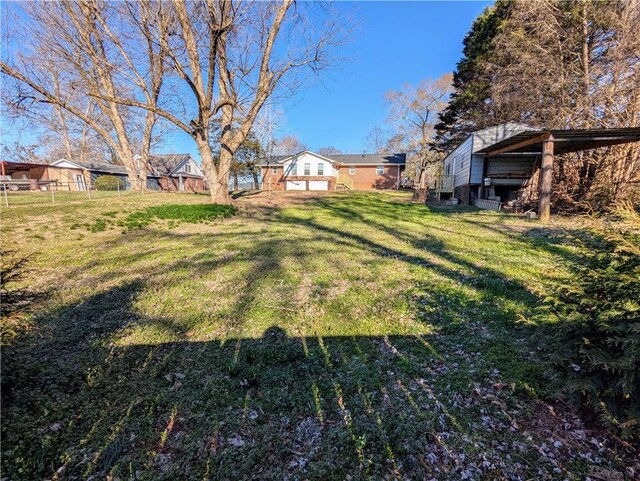 view of property exterior featuring crawl space, brick siding, and a lawn