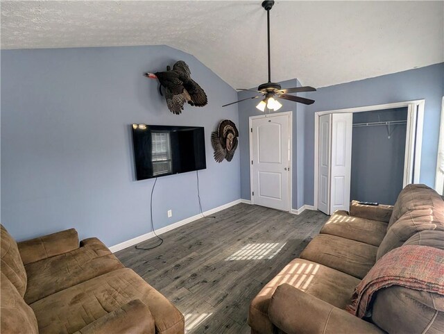 full bath featuring a wainscoted wall, tile walls, toilet, vanity, and tile patterned flooring