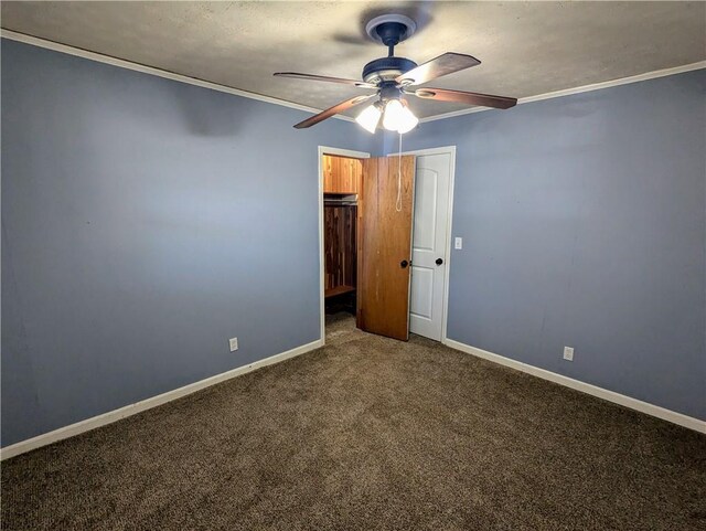 unfurnished room featuring ornamental molding, a healthy amount of sunlight, visible vents, and carpet flooring