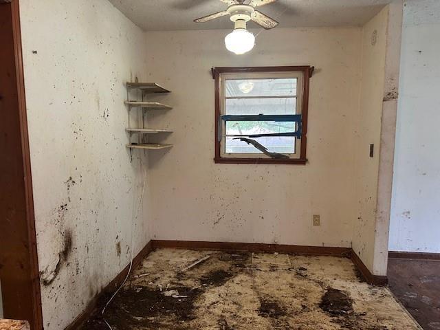 2588 Sandtown Rd SW, Marietta, GA 30060 - empty room featuring a ceiling fan and baseboards
