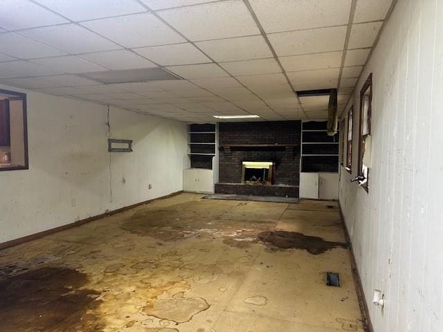 2588 Sandtown Rd SW, Marietta, GA 30060 - finished basement featuring a fireplace, baseboards, and a drop ceiling