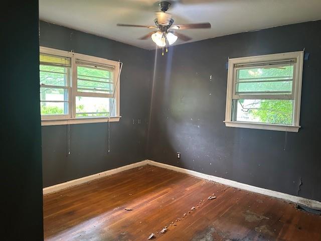 2588 Sandtown Rd SW, Marietta, GA 30060 - spare room with hardwood / wood-style floors, ceiling fan, and baseboards
