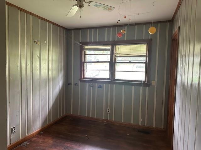 2588 Sandtown Rd SW, Marietta, GA 30060 - empty room with wood finished floors and ceiling fan