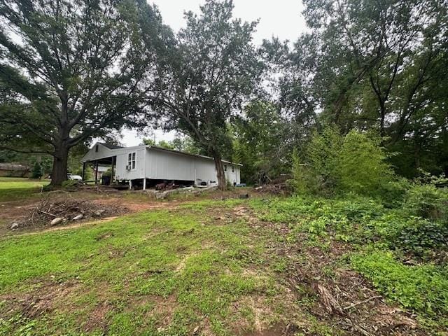 2588 Sandtown Rd SW, Marietta, GA 30060 - view of yard featuring a carport