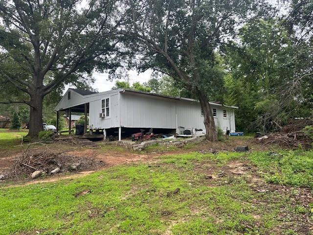 2588 Sandtown Rd SW, Marietta, GA 30060 - view of home's exterior with an attached carport
