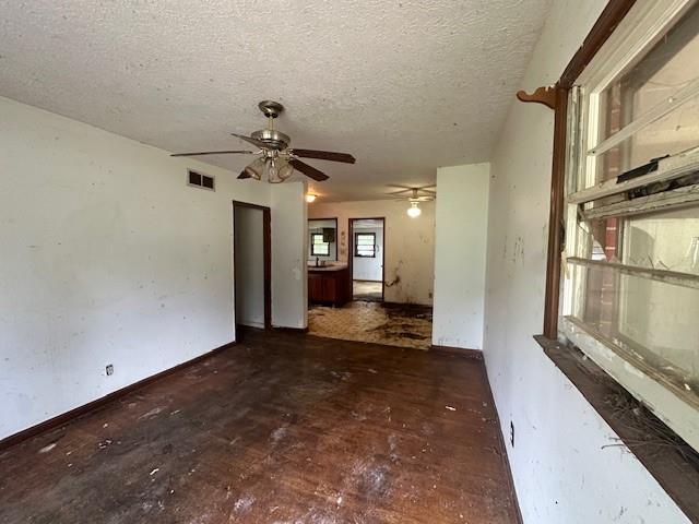 2588 Sandtown Rd SW, Marietta, GA 30060 - unfurnished room with ceiling fan and a textured ceiling