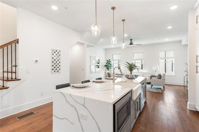 1032 Robert Smalls Way, Atlanta, GA 30318 - kitchen featuring appliances with stainless steel finishes, open floor plan, dark wood-type flooring, a sink, and recessed lighting