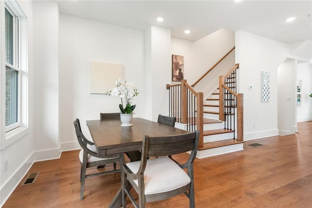 1032 Robert Smalls Way, Atlanta, GA 30318 - dining area featuring stairway, light wood-style floors, baseboards, and recessed lighting