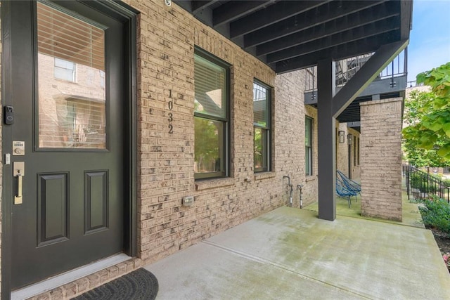 1032 Robert Smalls Way, Atlanta, GA 30318 - property entrance featuring brick siding and a patio area