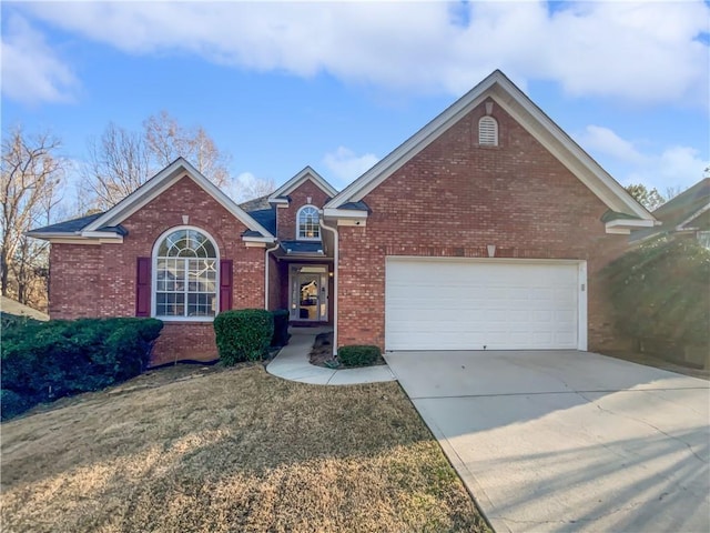 single story home with a garage, brick siding, driveway, and a front lawn