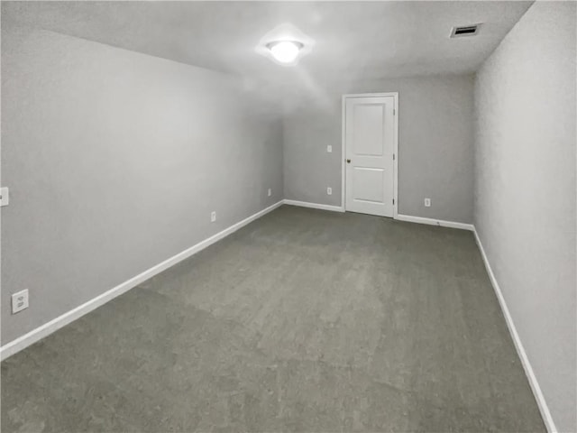 bonus room with baseboards, visible vents, and carpet flooring