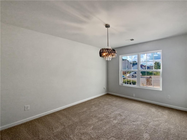 unfurnished room with carpet flooring