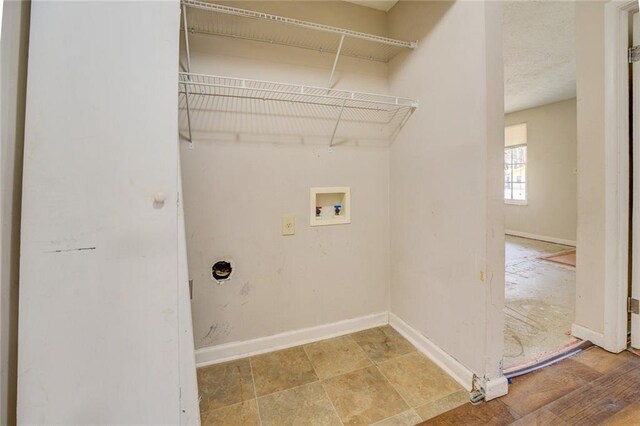 laundry room featuring hookup for a washing machine, wood-type flooring, and hookup for an electric dryer