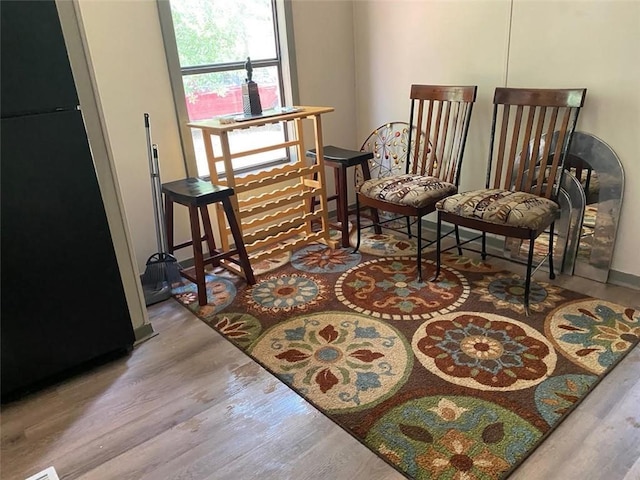 living area featuring light wood-style flooring