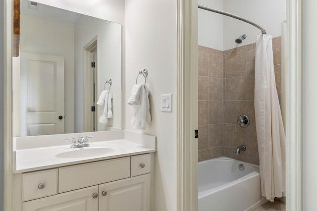 bathroom with vanity and shower / tub combo with curtain