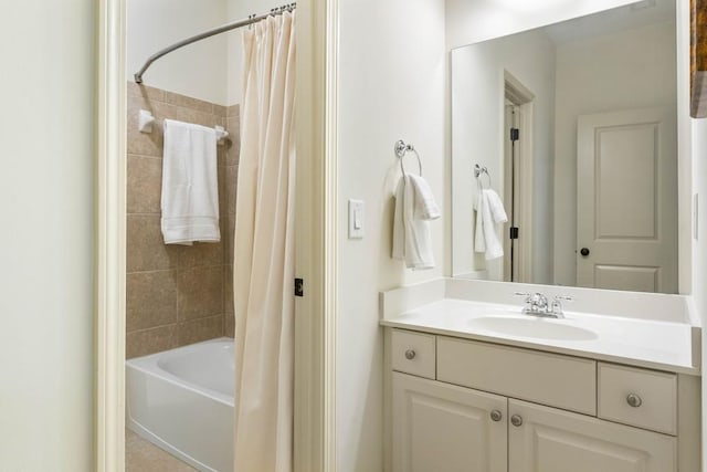 bathroom featuring vanity and shower / bath combo with shower curtain