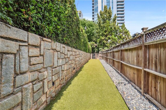 view of yard featuring a fenced backyard