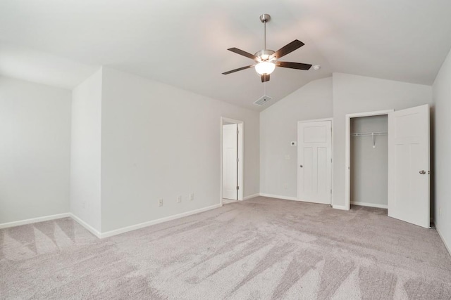 1360 Sugar Glen Ct, Lawrenceville, GA 30044 - unfurnished bedroom with carpet flooring, vaulted ceiling, ceiling fan, a closet, and baseboards